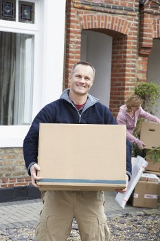 Local man with van moving boxes and furniture in Catford