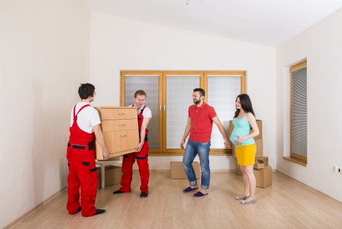 Packed boxes and furniture ready for transport by a local removal company