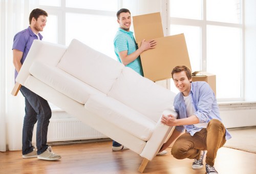Sustainable moving service with sorted recyclable materials and donated furniture