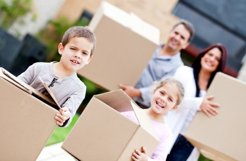 Packed boxes and furniture prepared for a Catford move