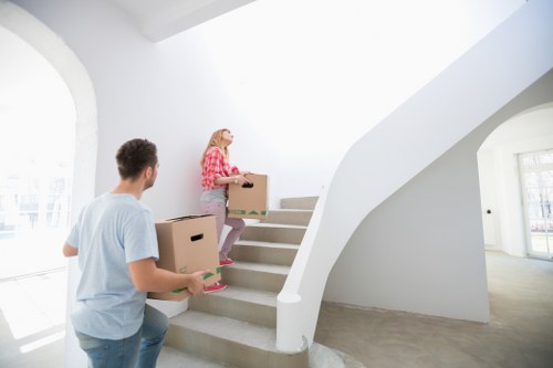 Moving team loading furniture for a house removal in Catford